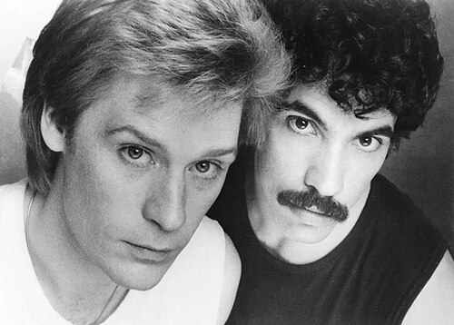 A black and white portrait of Daryl Hall and John Oates from a 1980 RCA press photo