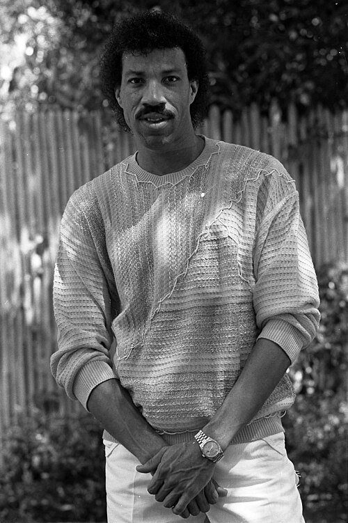 Lionel Richie in a 1984 portrait wearing a sweater