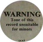 The original 1985 record industry warning sticker reading Tone of this record unsuitable for minors