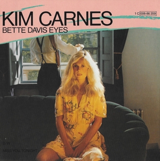 The single cover art for Bette Davis Eyes by Kim Carnes, a photo of Carnes seated on a couch
