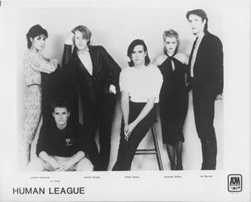 A 1982 promotional photo of the six members of The Human League posed together in black outfits