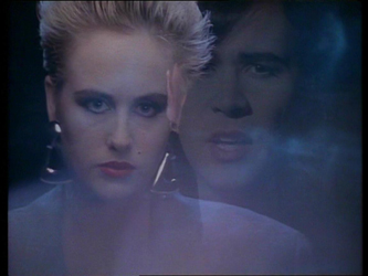 A double-exposed still from the 1986 Human music video