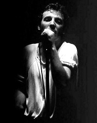 Bruce Springsteen singing into a microphone during the 1981 River Tour