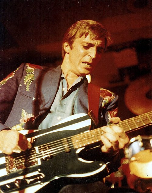 Mick Ronson in 1981, the ex-David Bowie guitarist who rescued Jack and Diane with baby-rattle percussion and the let it rock chant