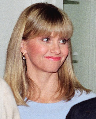 A close up portrait of Olivia Newton-John, 1988