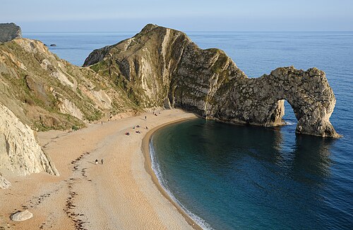Durdle Door, the natural limestone arch on the Dorset coast where the Shout video was filmed
