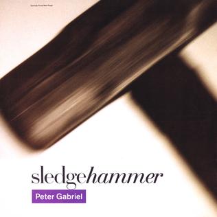 The single cover art for Sledgehammer by Peter Gabriel, a blurred motion photo of a swinging sledgehammer