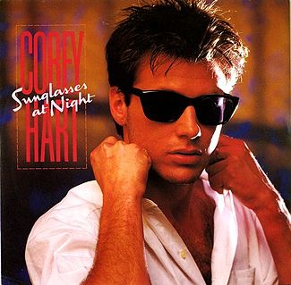 The Corey Hart Sunglasses at Night single cover, a close portrait wearing dark sunglasses