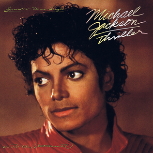 The Michael Jackson Thriller 12 inch single cover, a close portrait against a red jacket