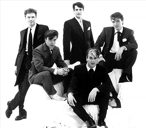 A 1983 black and white publicity photo of the five members of Spandau Ballet in suits