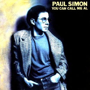 The Paul Simon You Can Call Me Al single cover, a portrait in a tweed jacket against a black background
