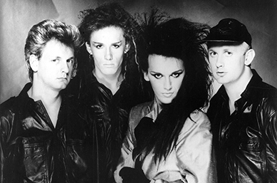 Dead or Alive, with Pete Burns at center, in a mid-1980s promotional photo