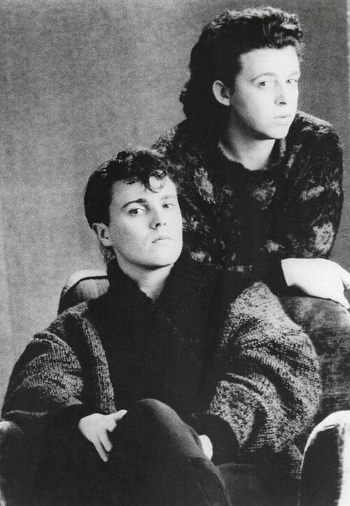 A black and white 1985 publicity portrait of Roland Orzabal and Curt Smith of Tears for Fears
