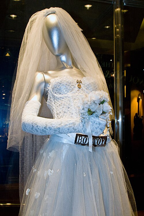 A museum display of the Boy Toy wedding dress costume Madonna wore performing Like a Virgin at the first MTV Video Music Awards